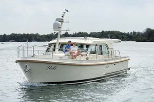 barco cabinado intraborda / diésel / con hard-top / fluvial