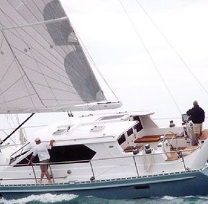 yate de vela de crucero / con popa abierta / a medida