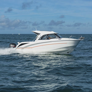 cabin-cruiser fueraborda / con caseta de timón / 9 personas máx. / con solárium