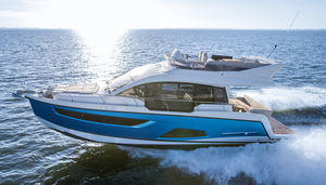 barco cabinado intraborda / bimotor / con fly / 12 personas máx.