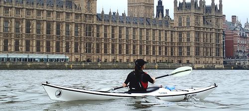 Kayak de travesía - xplore series - Tiderace Sea Kayaks - de mar / para adulto / 1 plaza