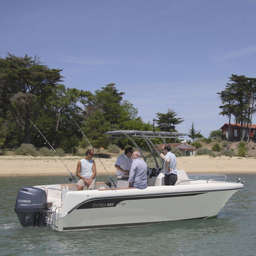Barco open fueraborda - OSTREA 600 - OCQUETEAU - con consola central / de pesca deportiva / de fibra de vidrio
