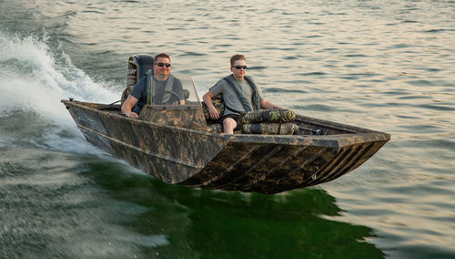 Jon boat fueraborda - Roughneck 1760 SC - Lowe - con consola lateral / open / para la pesca