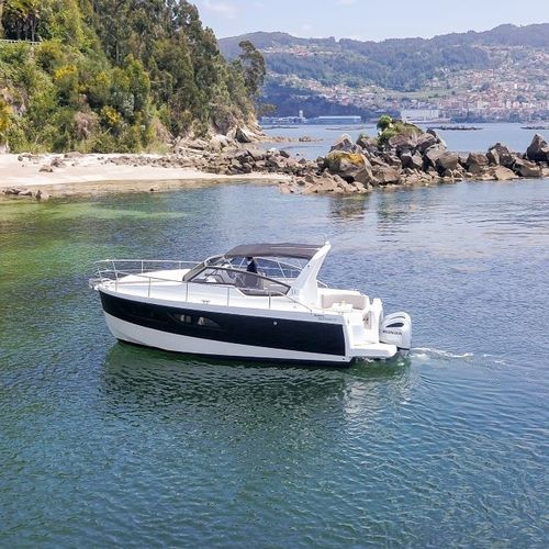 Cabin-cruiser fueraborda - SPIRIT 31' - Rodman - bimotor / open / con doble consola