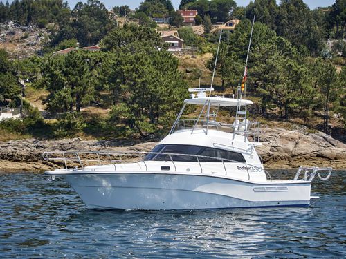 Barco cabinado intraborda - 1290 Fisher Pro - Rodman - bimotor / con fly / de pesca deportiva