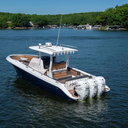Barco open fueraborda - 39NX - Fountain Powerboats - trimotor / con consola central / de pesca deportiva