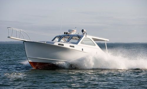 Barco cabinado intraborda - PATRIOT - Ellis Boat - diésel / de semidesplazamiento / de pesca deportiva