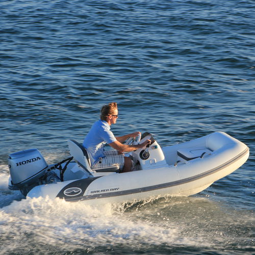 Embarcación neumática fueraborda - 325 STX Deluxe - Walker Bay Boats - semirrígida / open / con consola lateral