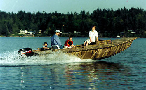 Bay boat fueraborda - Honker 18 - Devlin - open / con consola lateral / de pesca deportiva