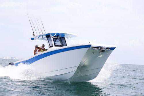 Barco open catamarán - 280CC-X - World Cat - fueraborda / bimotor / con consola central