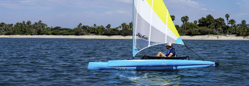 Kayak sit-on-top - Mirage Adventure Island - Hobie Kayak - para adulto / 1 plaza / trimarán