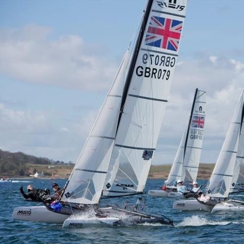 Catamarán deportivo con foil - 15 Olympic - Nacra Sailing - individual / con dos trapecios / de PRFV