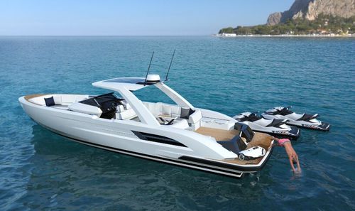 Barco cabinado intraborda - Pascoe International - open / con consola central / de deporte