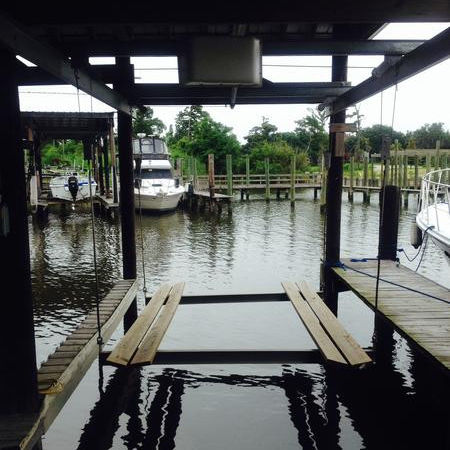Ascensor para barco pontón - Lunmar Boat Lifts - flotante / con cobertura / de acero galvanizado