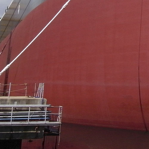 Recubrimiento antifouling para buques mercantes - Interflex 8700 SPC - International Marine - para barco profesional / autopulimentante / de alta eficacia