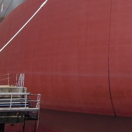 Recubrimiento antifouling para buques mercantes - Intersmooth 7465HS SPC - International Marine - para barco profesional / autopulimentante / de alta eficacia