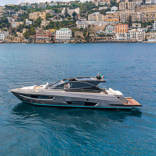 Yate a motor de deporte - COUPÈ 58 - RIO YACHTS - clásico / open / soft-top