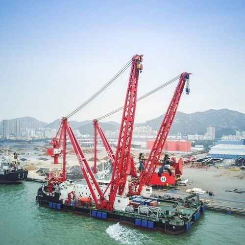 Grúa sobre muelle flotante - Huisman - para carga pesada / de brazo articulado / offshore