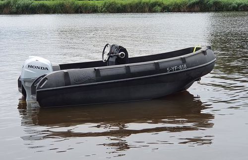 Bote fueraborda - 400 - WHALY BOATS  - open / con consola central / de recreo