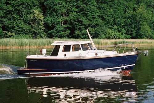 Barco de motor de pesca-paseo intraborda - 700MSD - HABER YACHTS Sp. z o.o.  - diésel / con caseta de timón / 5 personas máx.