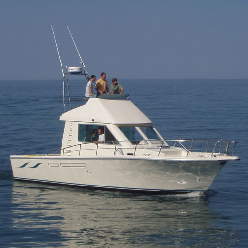 Barco cabinado intraborda - MARTINEZ CONSTRUCTIONS NAVALES - diésel / bimotor / con fly