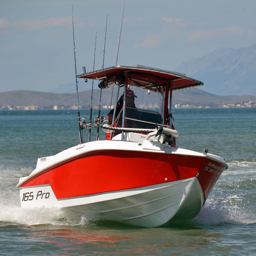 Barco open fueraborda - 165Pro - Compass Boats - con consola central / de pesca deportiva / 6 personas máx.
