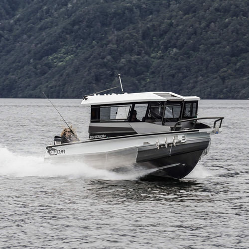 Barco de motor de pesca-paseo fueraborda - 2250 ULTRACAB WT - Stabicraft - con caseta de timón / 8 personas máx.