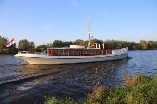 Yate a motor de crucero - Trimm Design BV - clásico / con caseta de timón / híbrido