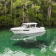 barco cabinado fueraborda / bimotor / open / con consola lateral
