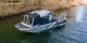bote intraborda / con caseta de timón / aguas bravas / de aluminio