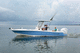 bay boat fueraborda / con consola central / open / de pesca deportiva