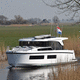 barco cabinado intraborda / diésel / eléctrico / con hard-top