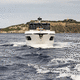 barco cabinado fueraborda / trimotor / soft-top / de crucero costero