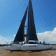 trimarán / de crucero oceánico / de carbono / con bauprés